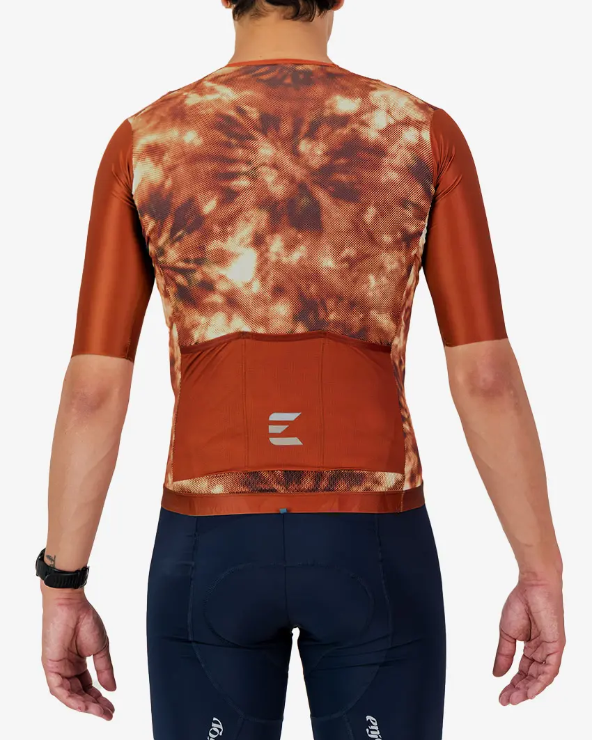 Back view of the ProXision men's cycling zipless jersey in a rust tie-dye design made by enjoy.cc