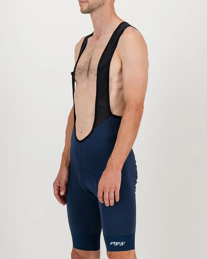 Side view of the Enjoy ProXision mens cargo bib short in the petrol colourway made by enjoy.cc