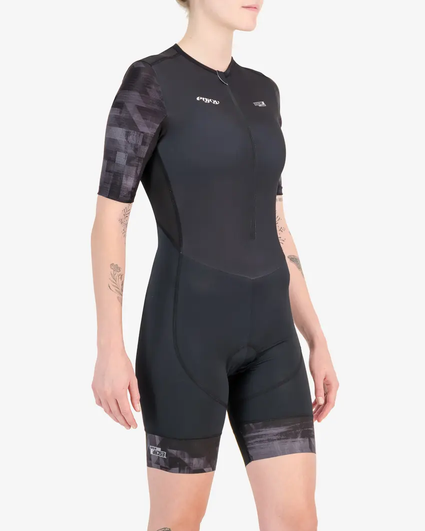 Three quarter of the womens sleeved tri suit in the Pace design. Triathlon clothing made by Enjoy.cc