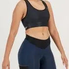 Side view of the womens sports bra in the black emotif design made by Enjoy.cc