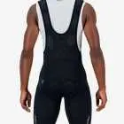 Back view of the Enjoy Dual men's bib short in black with reflective detailing made by enjoy.cc.