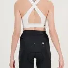 Back view of the womens sports bra in the white emotif design made by Enjoy.cc