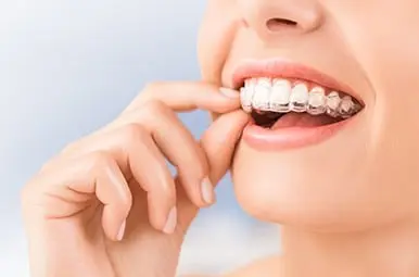 Woman with Invisalign in Greenwood, Village