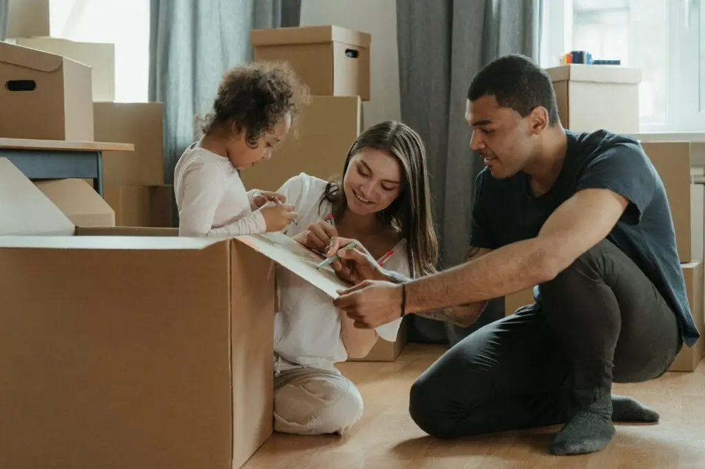 Moving, Step by Step: How to Move with Fewer Hassles 2 people packing
