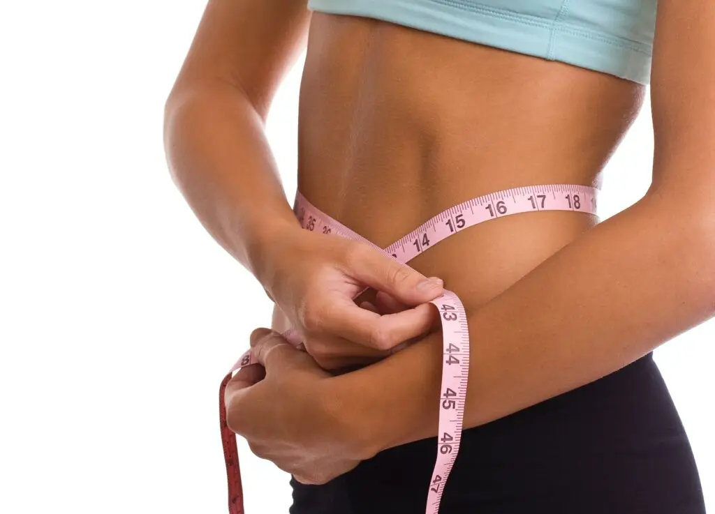 woman measuring weight