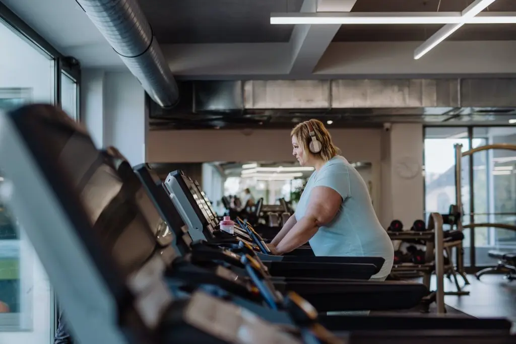 woman working out on a treadmill, medical weight loss