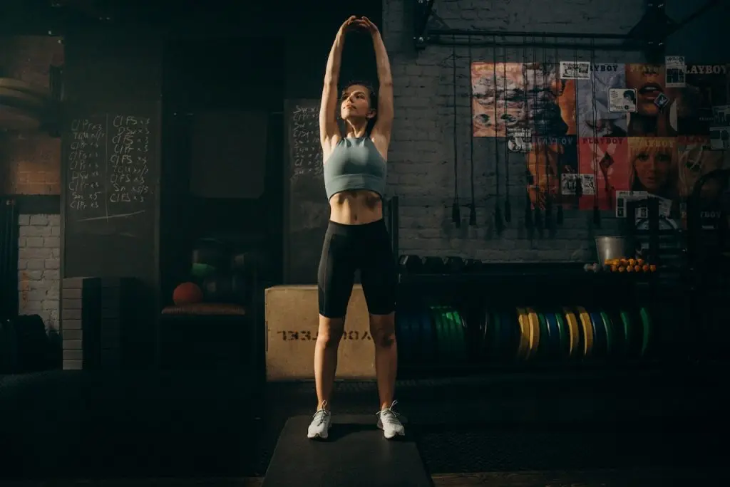 woman stretching at the gym