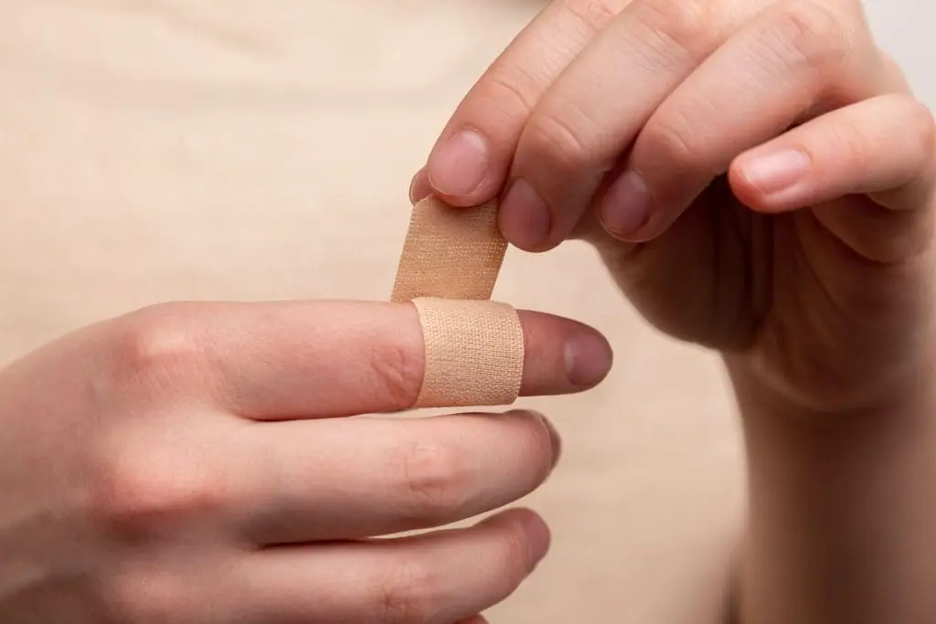 putting band aid