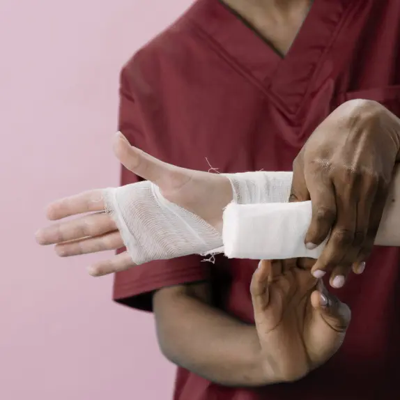 doctor treating injured worker
