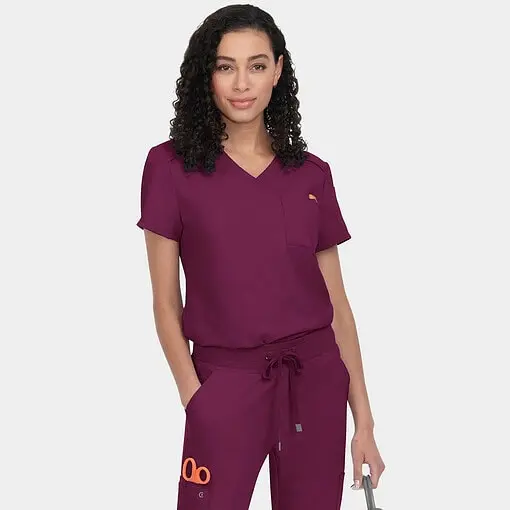 Cureology aura top c100 in wine — women's v-neck scrub top model photo
