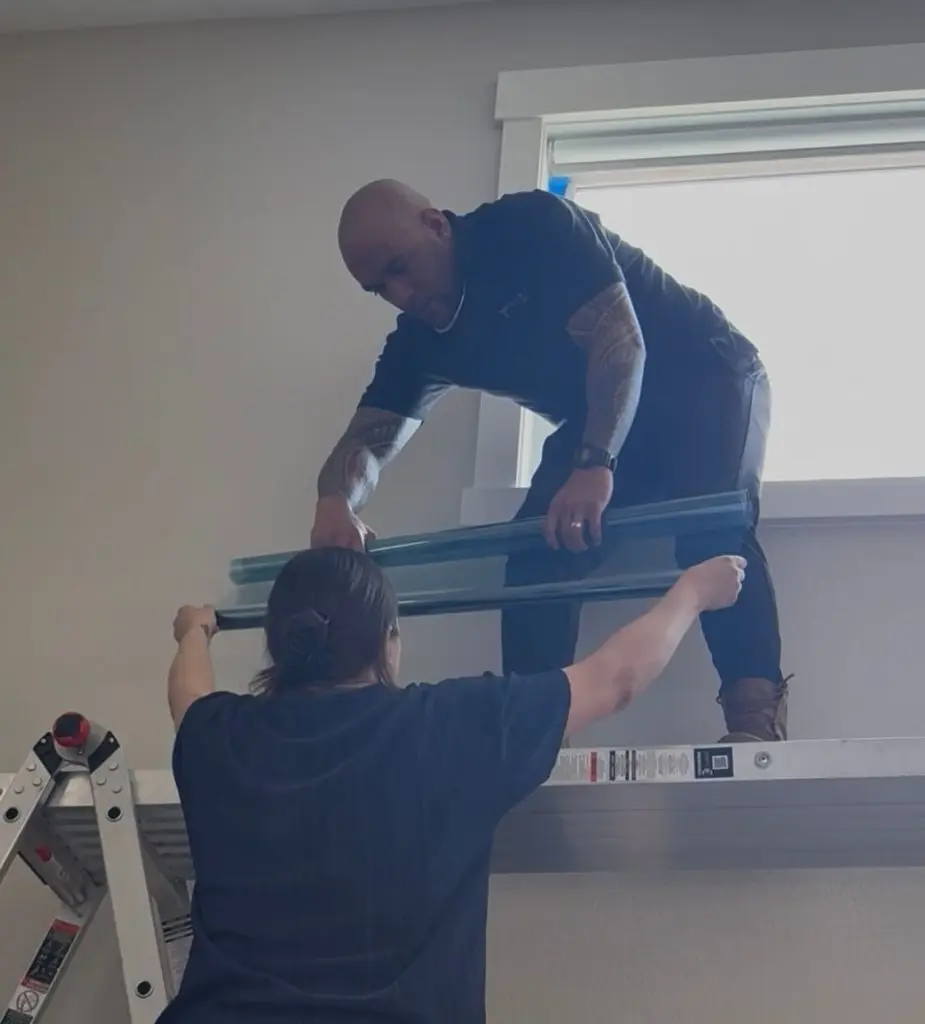 The Tried & True Tint Team Installing Window Film at a home in Montana