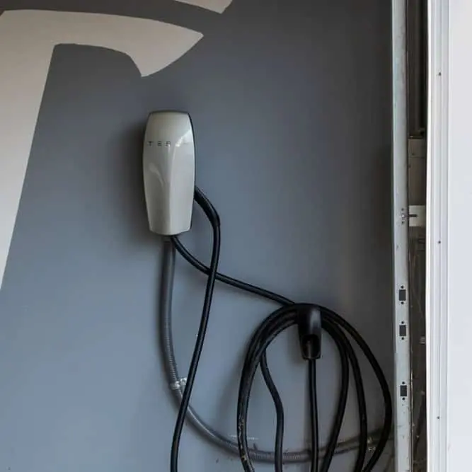 EV charger Tesla charger installed on garage wall