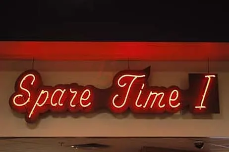 Spare Time sign at night