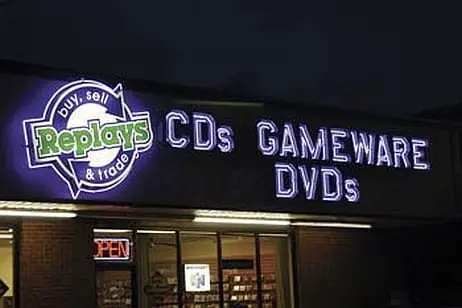 Replays Outdoor sign at night