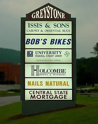 Greystone sign at night