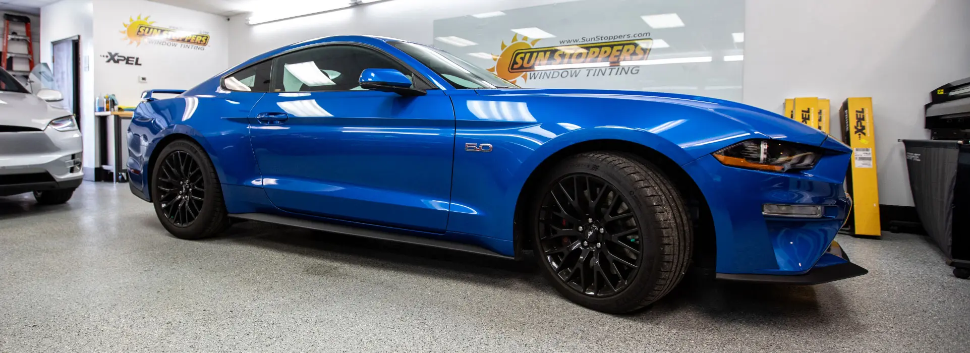 Sun Stoppers business opportunity team and automotive window tint shop