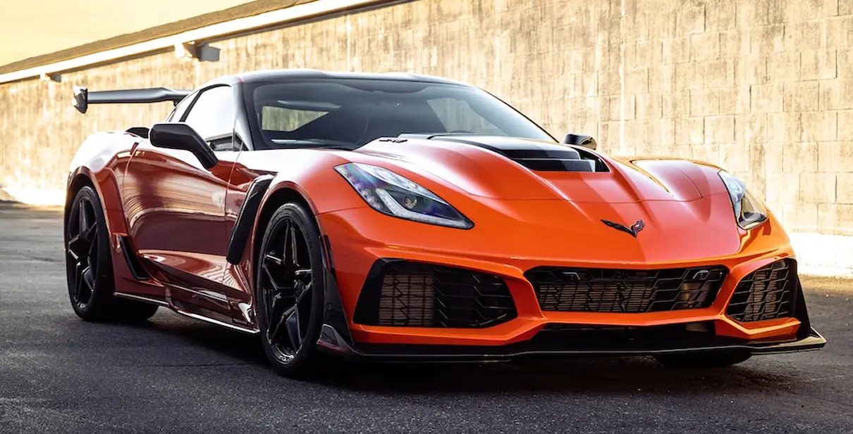 Orange Corvette protected by Sun Stoppers