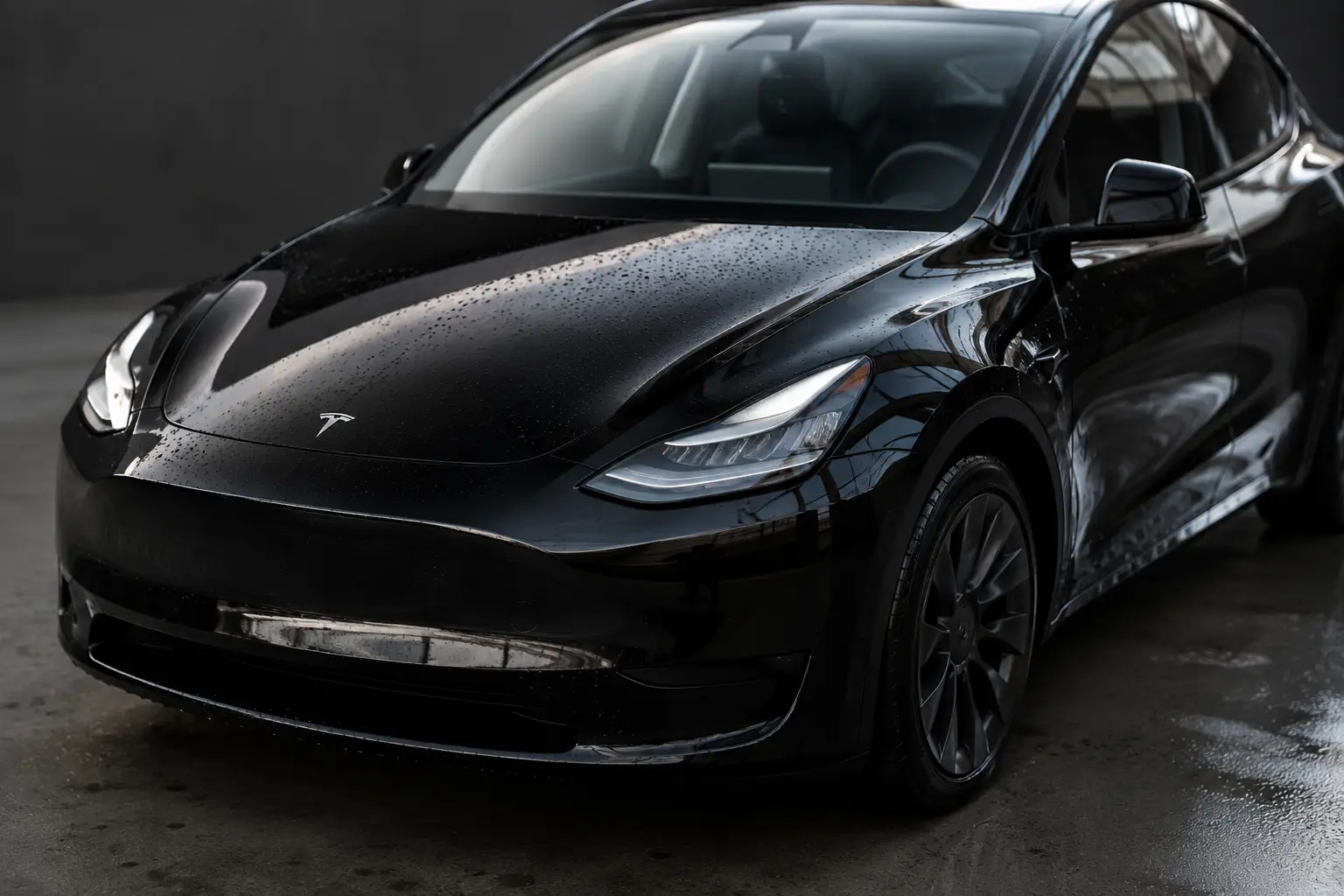 Tesla ceramic coating for gloss, hydrophobic protection, and easier maintenance
