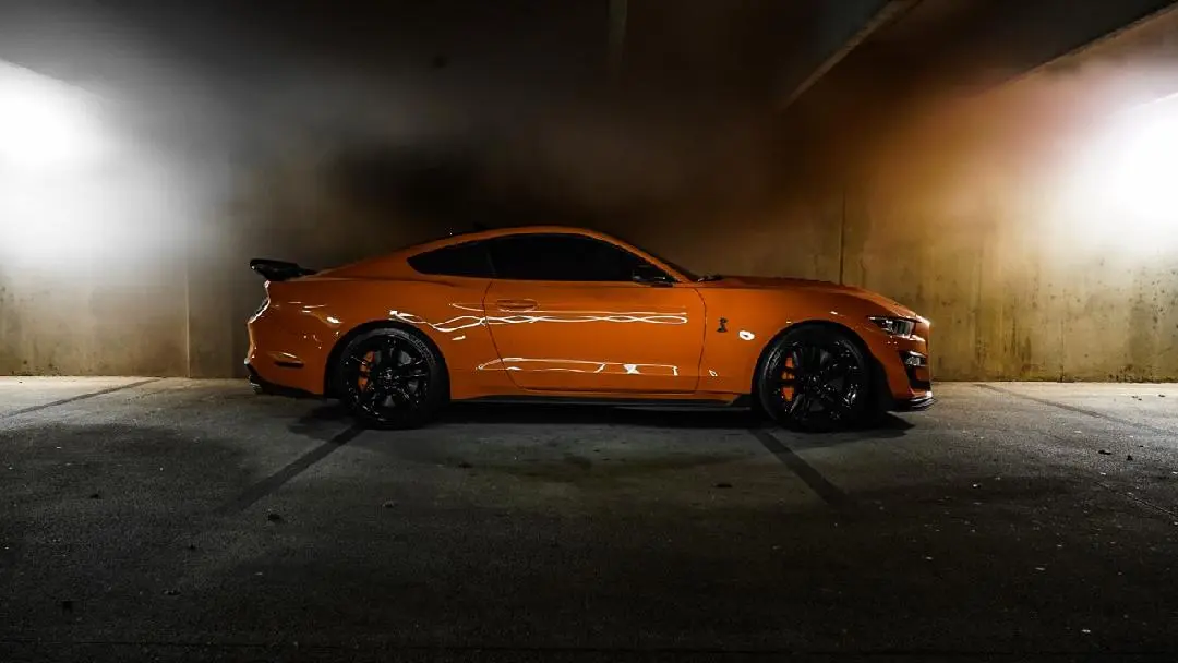 Orange performance car with a deep protected finish