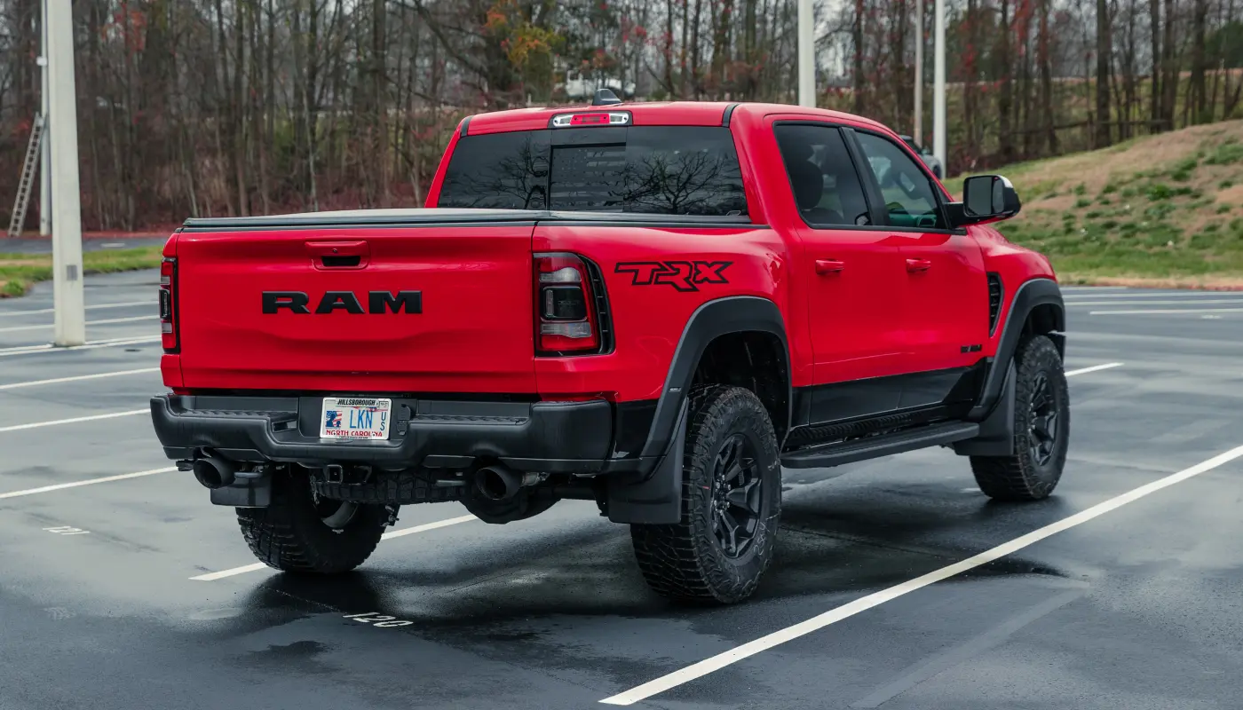 Red Ram TRX pickup truck with dark tinted windows