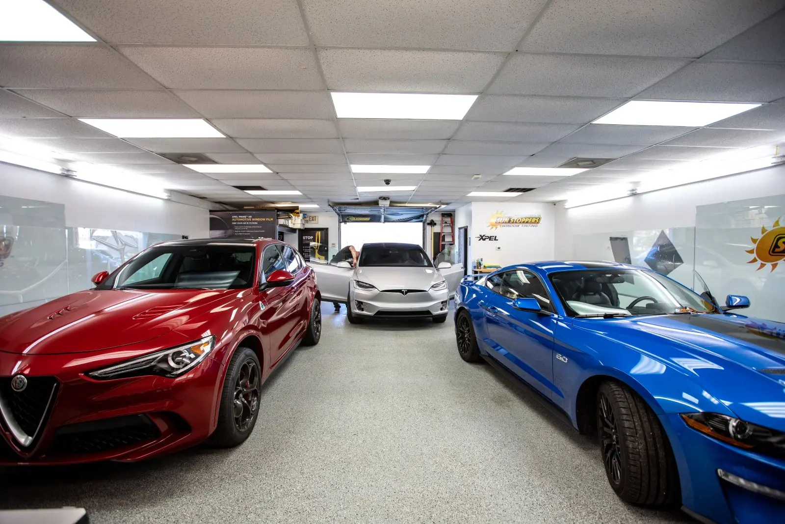 Team working together inside an automotive service business