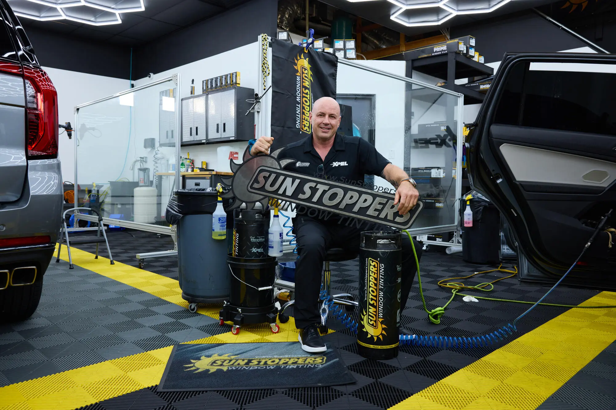 Sun Stoppers shop featured in the DIY versus professional window tint guide