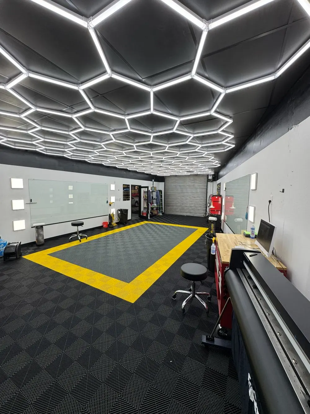 Inside a compact Sun Stoppers Express tint shop