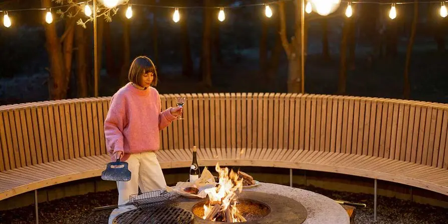 How To Highlight a Backyard Fire Pit With Outdoor Lighting