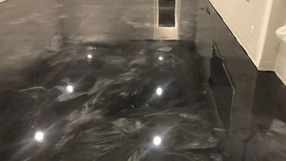 metallic epoxy flooring in basement. Wichita, KS. Higgins.