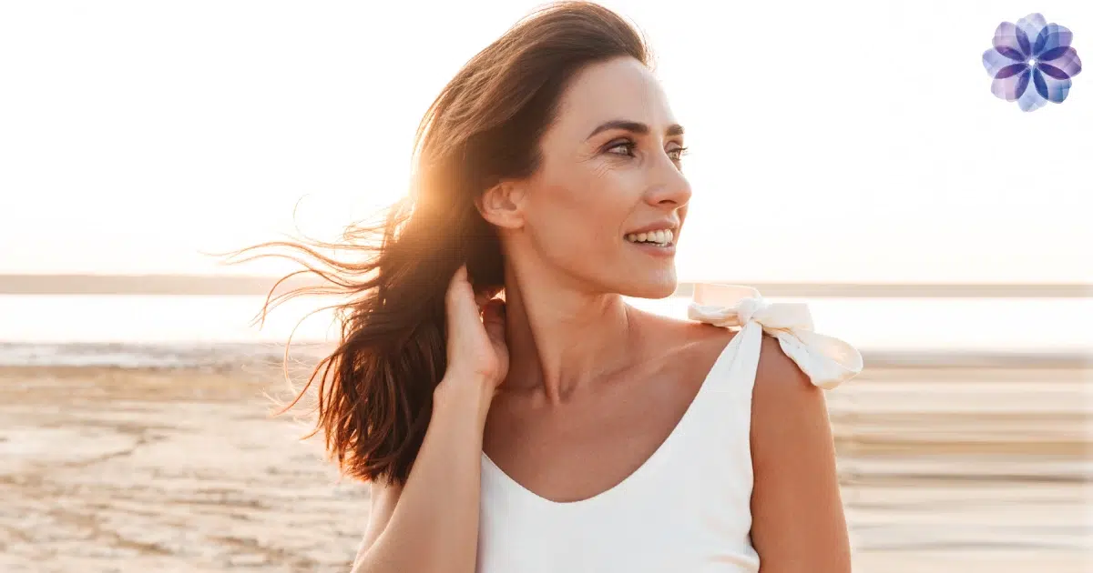 Happy woman standing outside