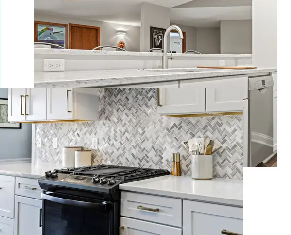 A modern kitchen featuring white cabinets and a sleek black stove.