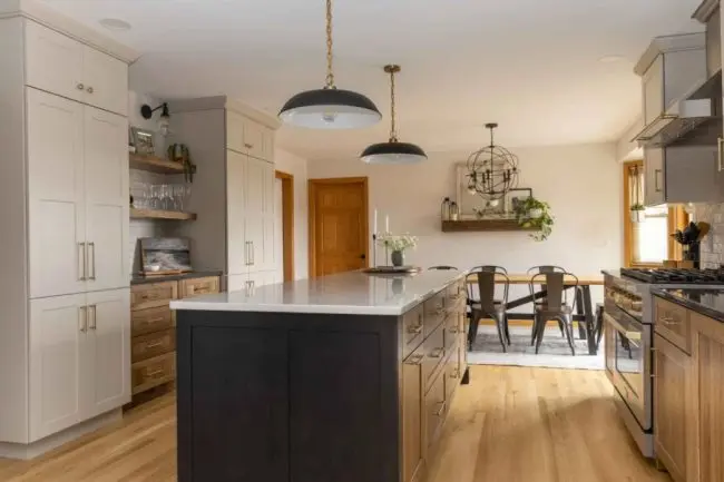 Remodeled kitchen with an open layout, island and ample storage