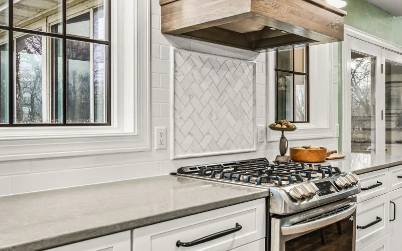 A kitchen featuring a stove and oven, showcasing a functional cooking space with modern appliances.