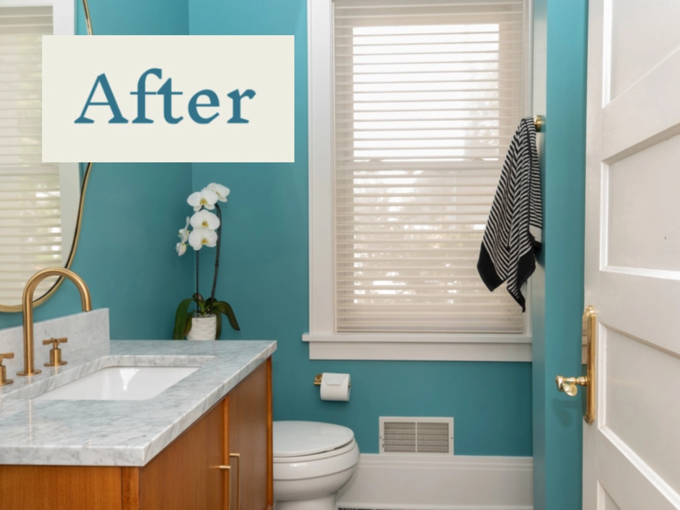 After bathroom remodel with teal walls, modern vanity, and updated fixtures.