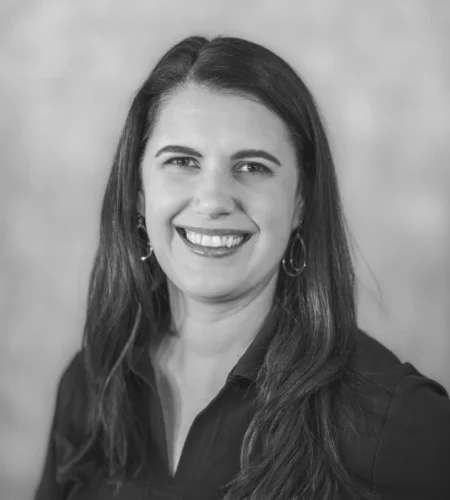 A black and white portrait of Kim Harrison