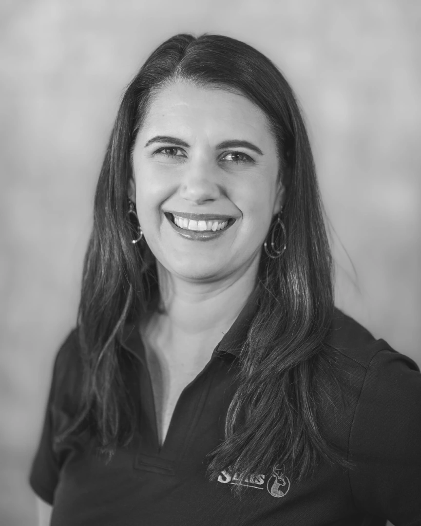 A black and white portrait of Kim Harrison