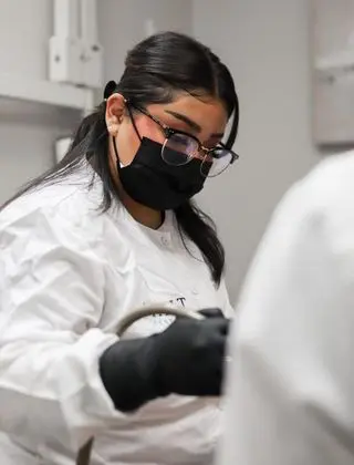 General Dentistry 3 Dentist working on a patient
