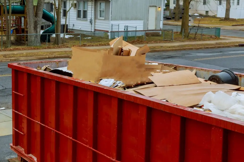 Dumpsters being full with garbage