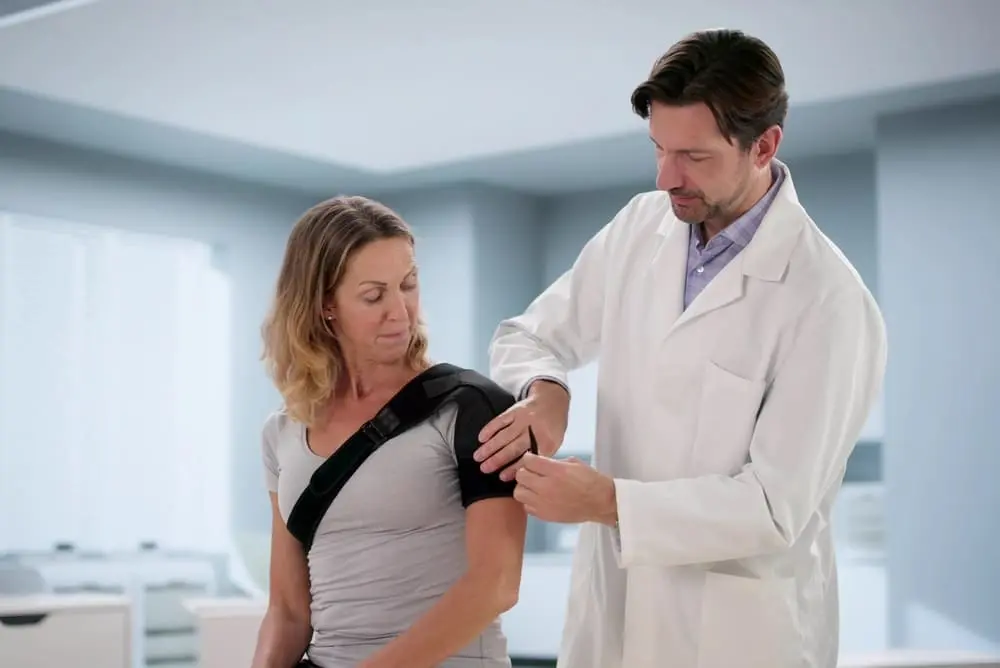 Orthopedic doctor examining a patient’s shoulder