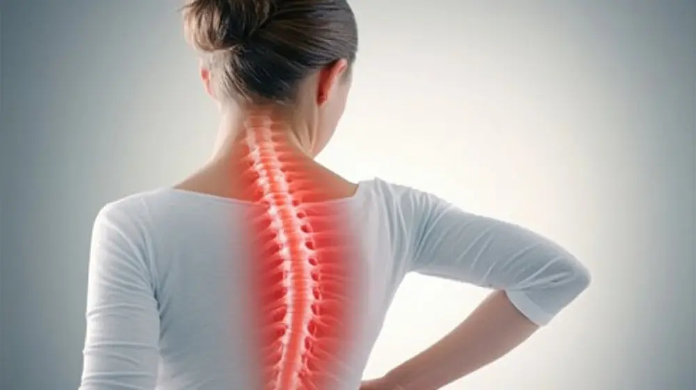 Spine osteoporosis. Spinal cord problems on woman's back