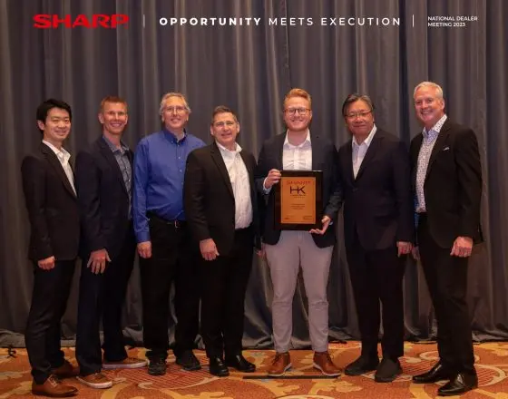 Team members of MMIT Business Solutions Group receiving an award