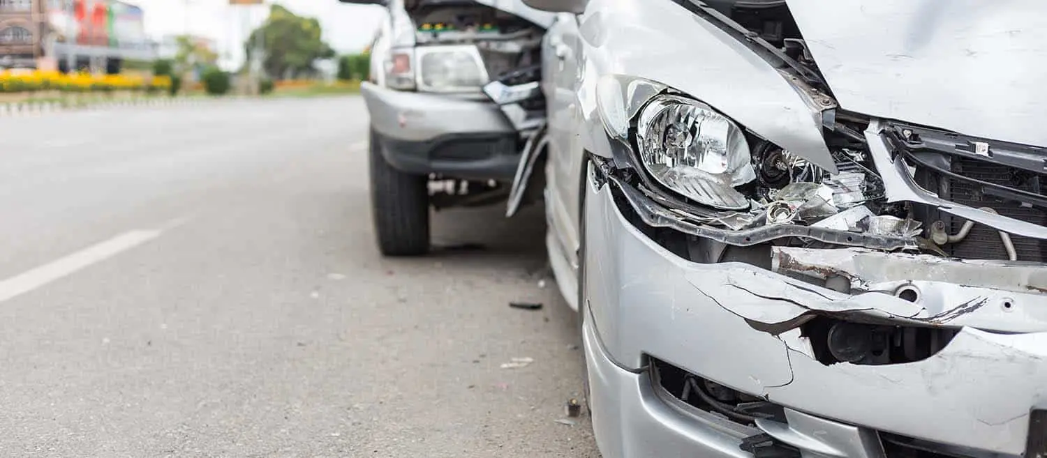 wrecked cars in new york where the drivers sustained injuries in the auto accident