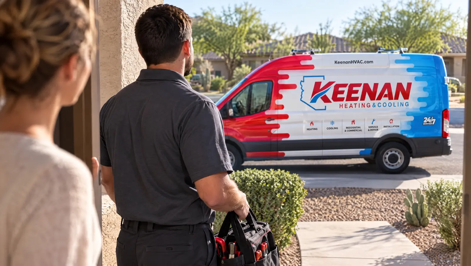 A technician carrying a tool bag at a front door with a homeowner, a Keenan Heating & Cooling van at the curb