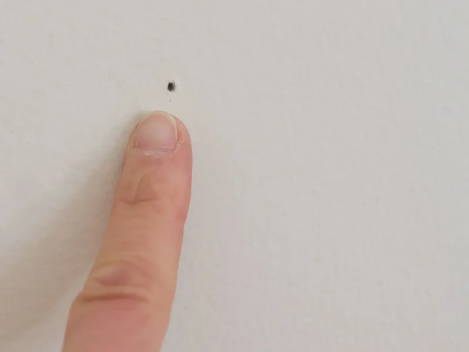 How to Patch Nail Holes and Dents Before Repainting