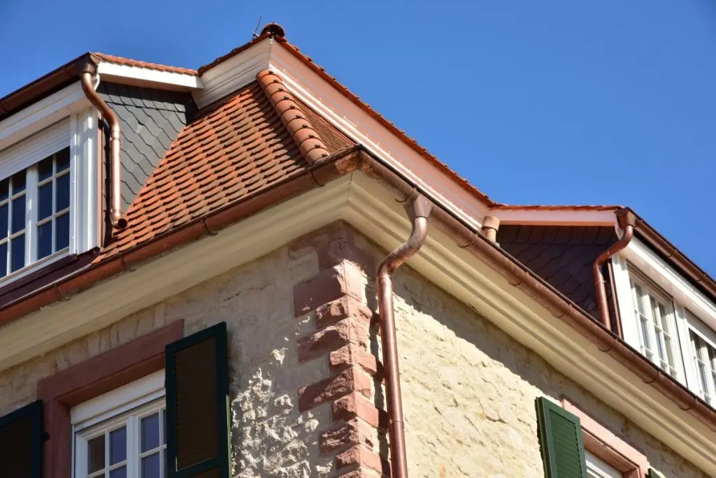 large house with copper gutters