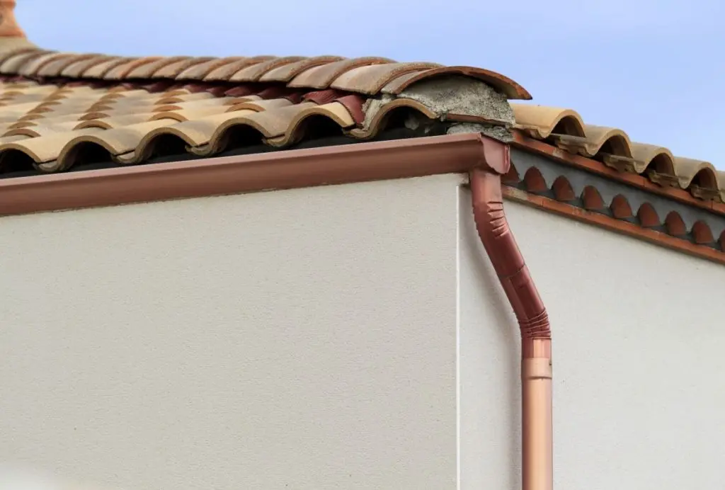 white building with copper gutters