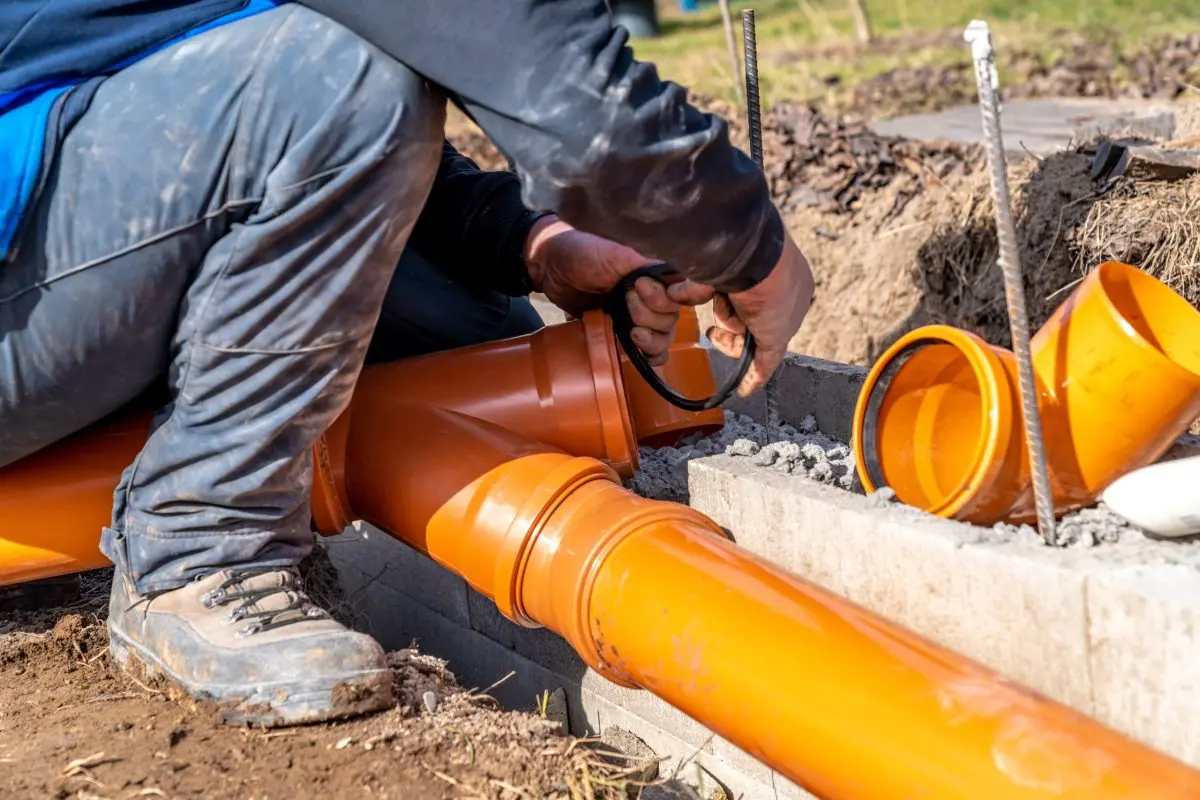PVC plastic pipe for sewerage in the ground.