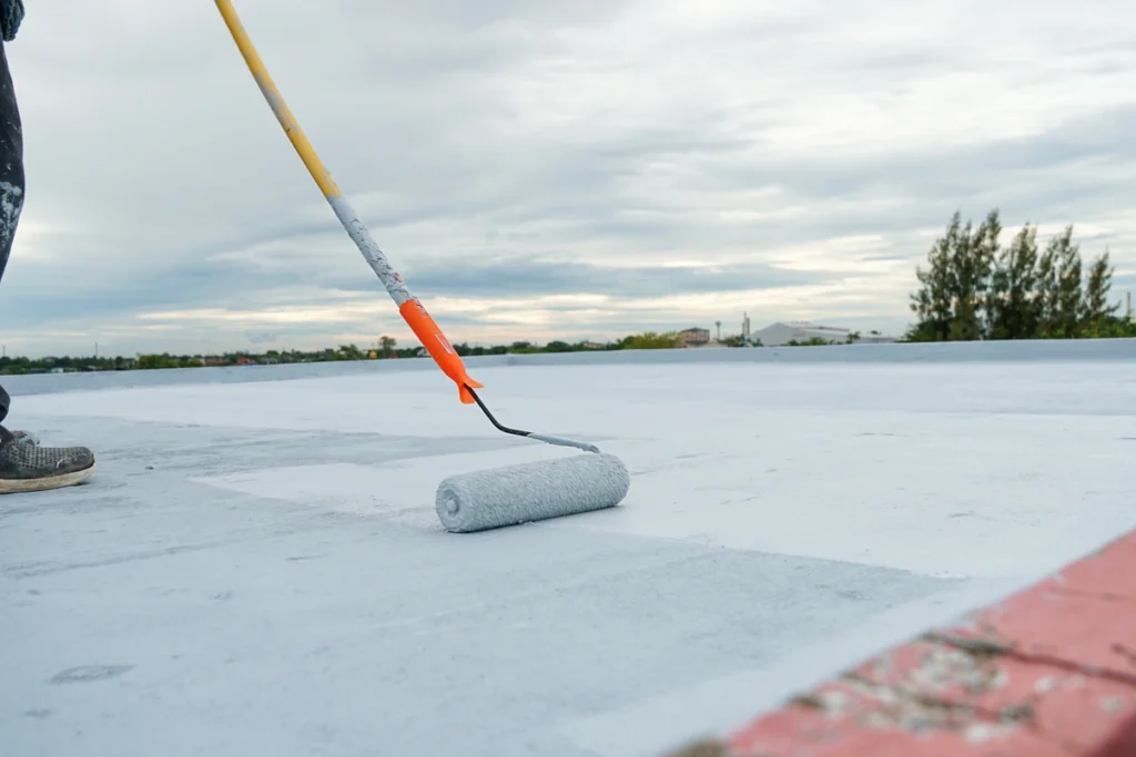 rolling on roof coating on roof
