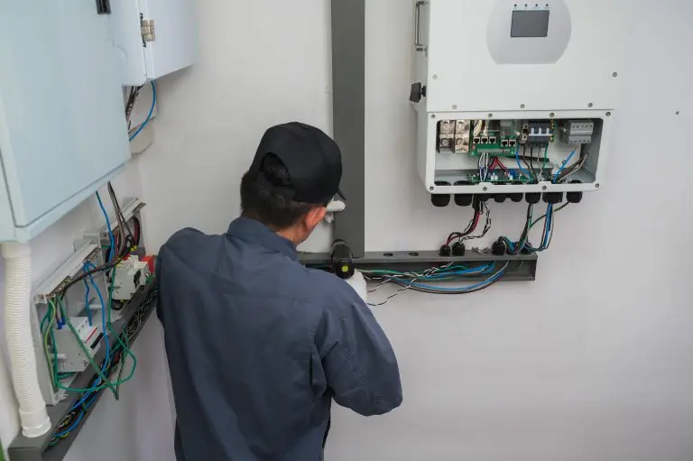 guy installing small generator