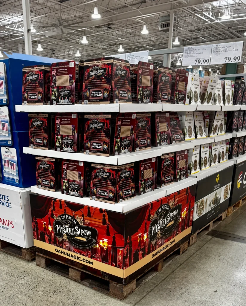 The Magical Mystery Show boxes stacked in a retail store, with pricing displayed.